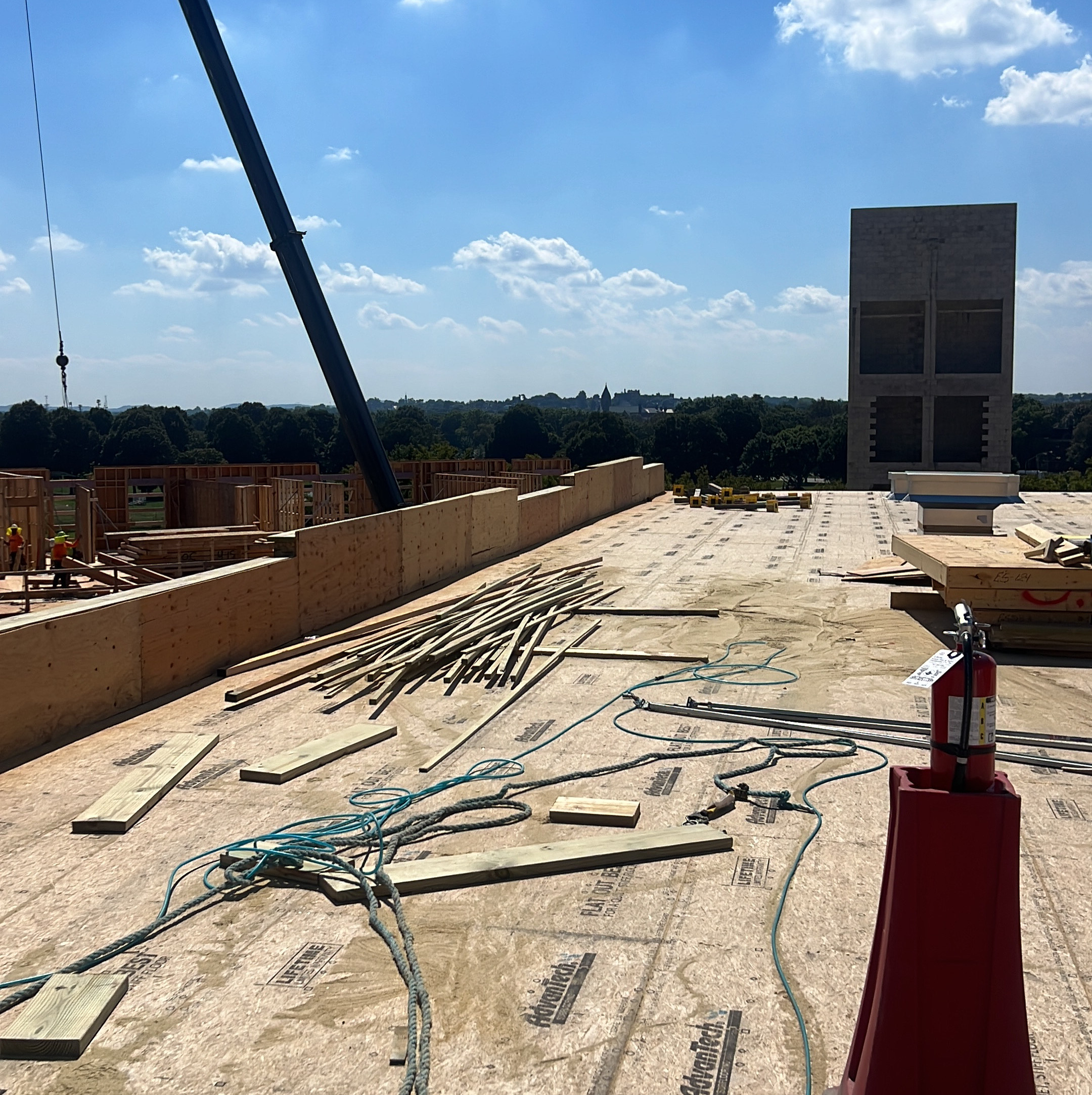 High-Rise Construction Site - Rooftop Framing Operations