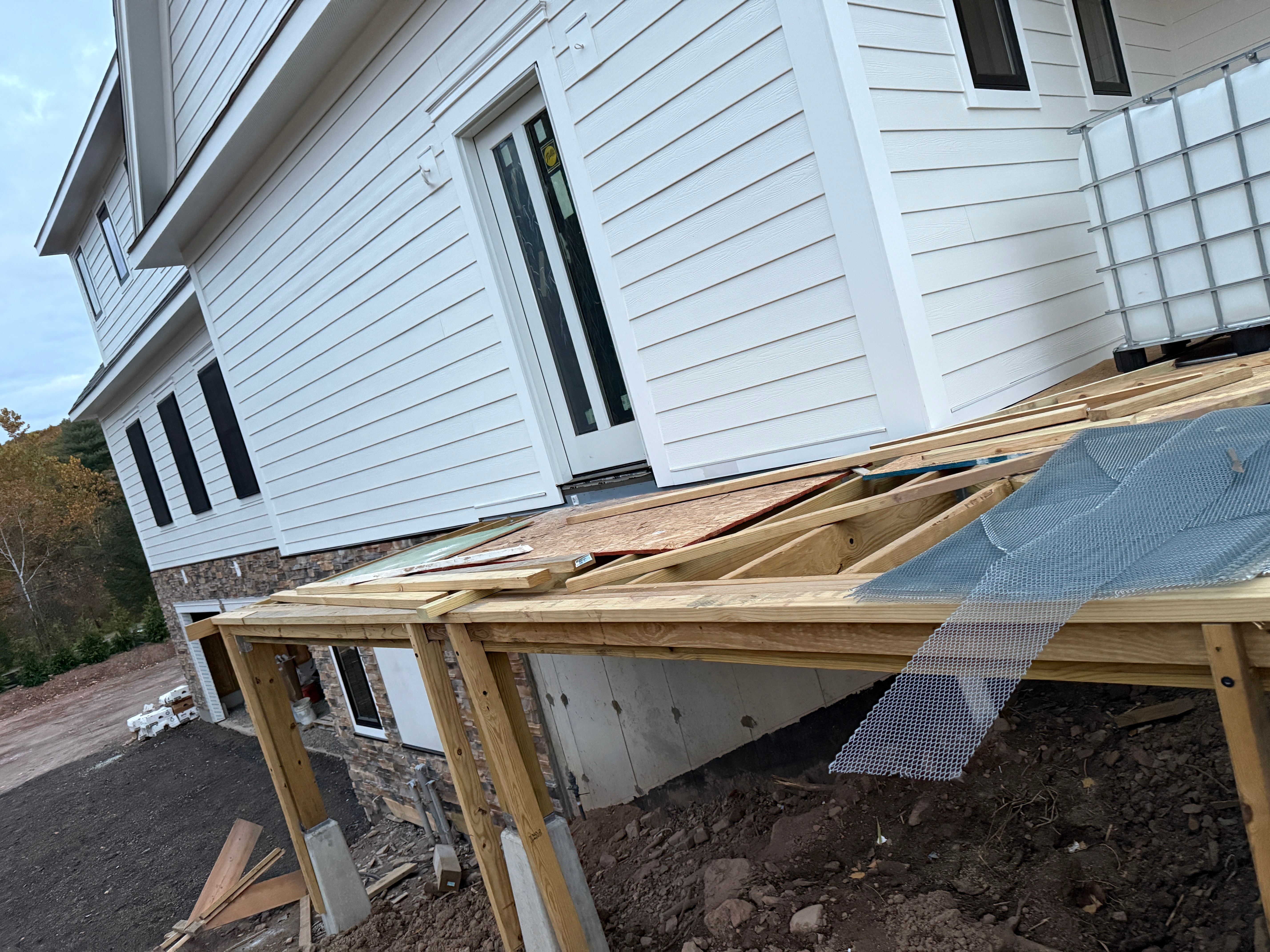 Elevated Deck Framing - Foundation Waterproofing and Joist Layout